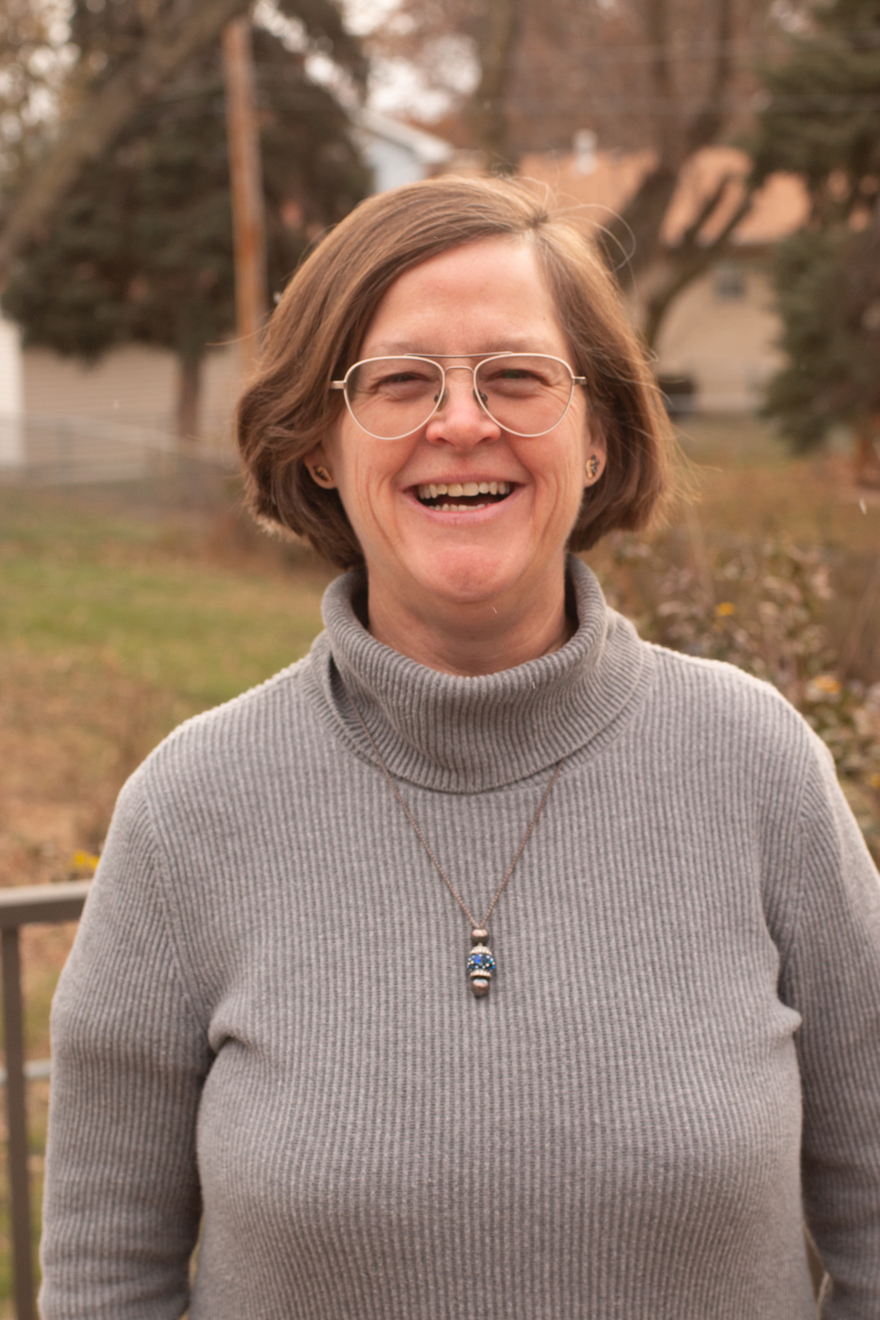 Pam Bass smiling outdoors