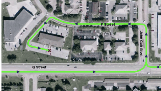 Aerial view showing the route from Q Street to John Galt Boulevard and P Street, then into the office driveway